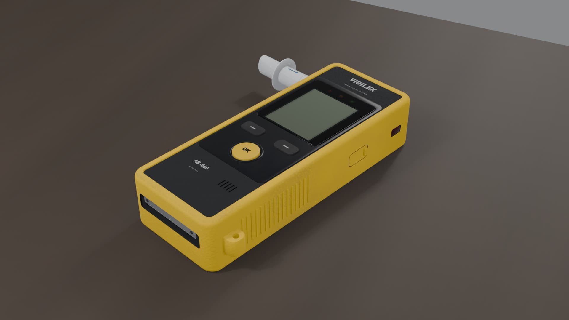 The yellow VIGILEX AB-560 breathalyzer lying on a desk with a mouthpiece in its side